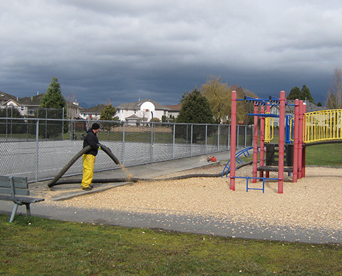 Playground wood chip installation