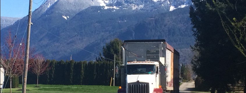 Denbow Transport Truck with snow-covered Mt. Cheam in background