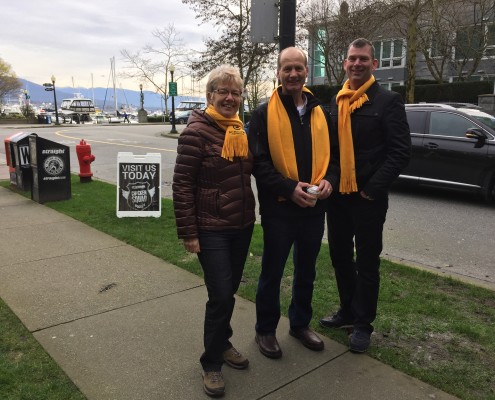 Margaret Dunn, Joe Neels and Steve Heppel serving egg sandwiches In Vancouver