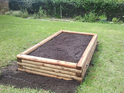 raised garden bed from interlocking landscaping ties